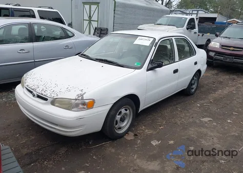 1999 Toyota Corolla Ve z USA, uszkodzony, nr VIN 1NXBR12E2XZ257771